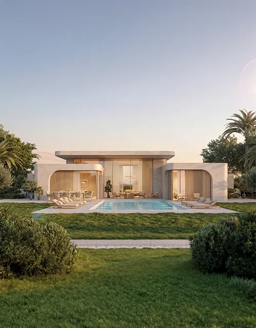 Single-storey villa and pool at dusk at Palm Hills One.